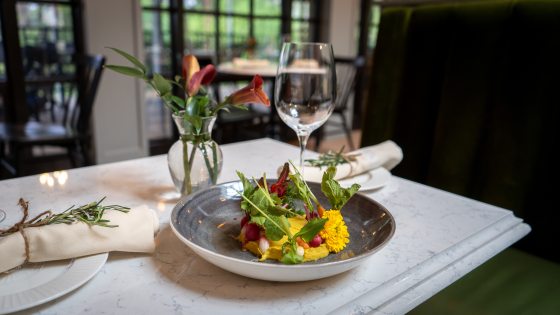 plate of food set on a white table 